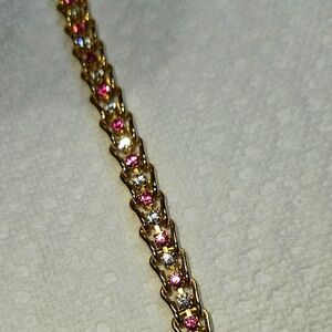 Elegant Gold and Pink Bracelet